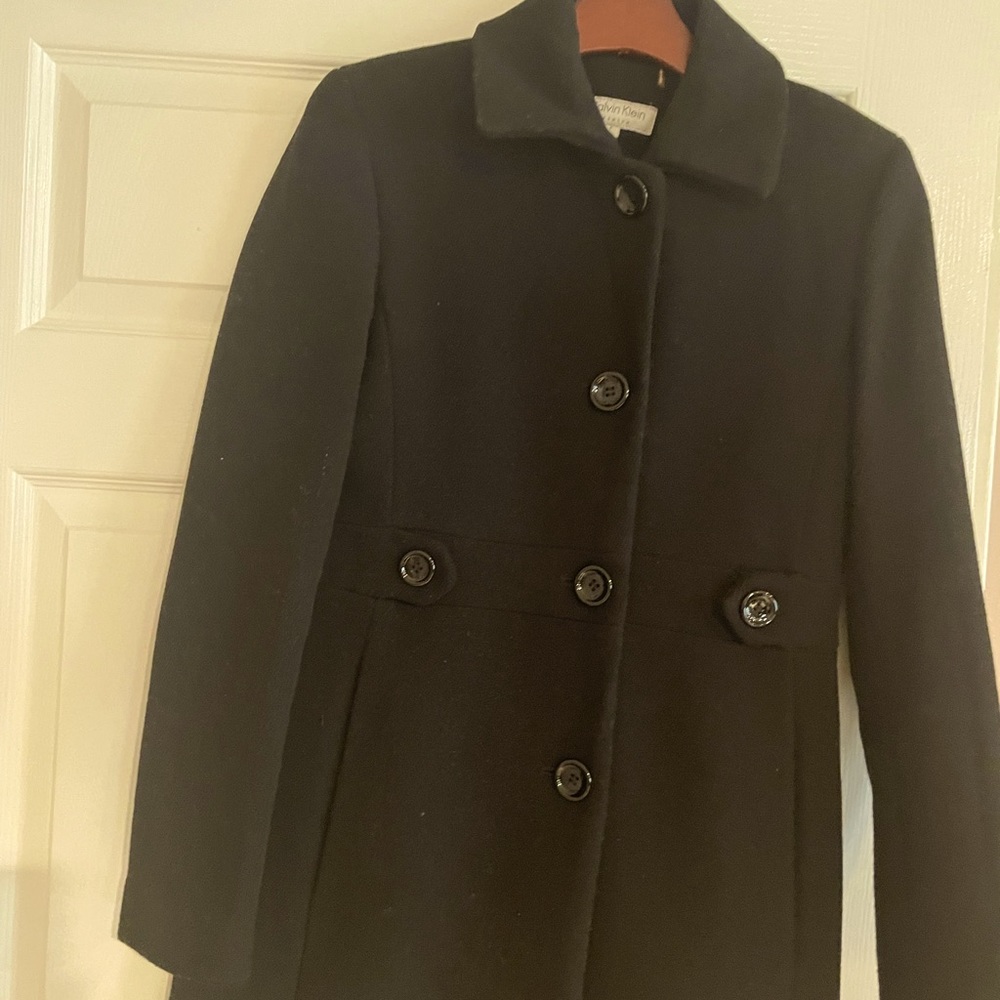 Calvin Klein coat with pink silk lining long sleeve with button closure
